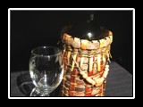 Wine Bottle Basket
Handwoven Bark, Grass, Cedar with handmade clay beads